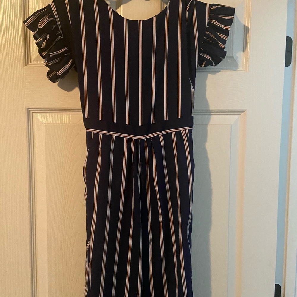 Navy blue with pink pinstripes. Girls (tween) size 12